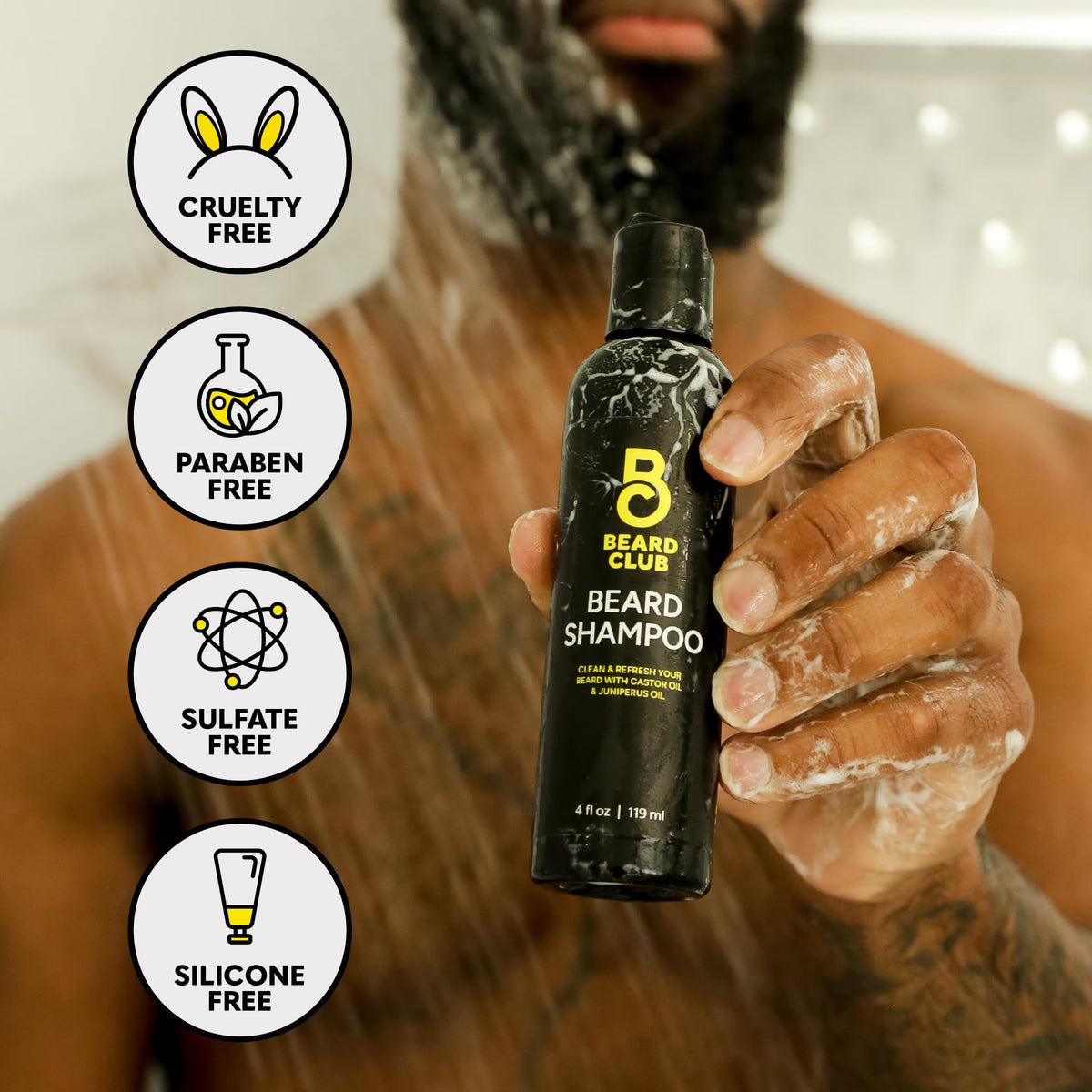The Beard Club lifestyle shot of man using products for tidy grooming routine