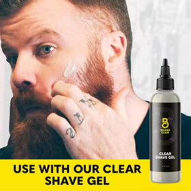 The Beard Club razor beside a coin to show compact size and travel-friendly design