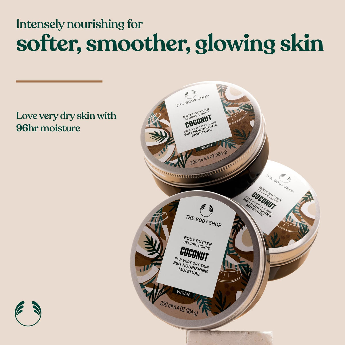 The Body Shop coconut body butter open tub texture showing creamy hydration