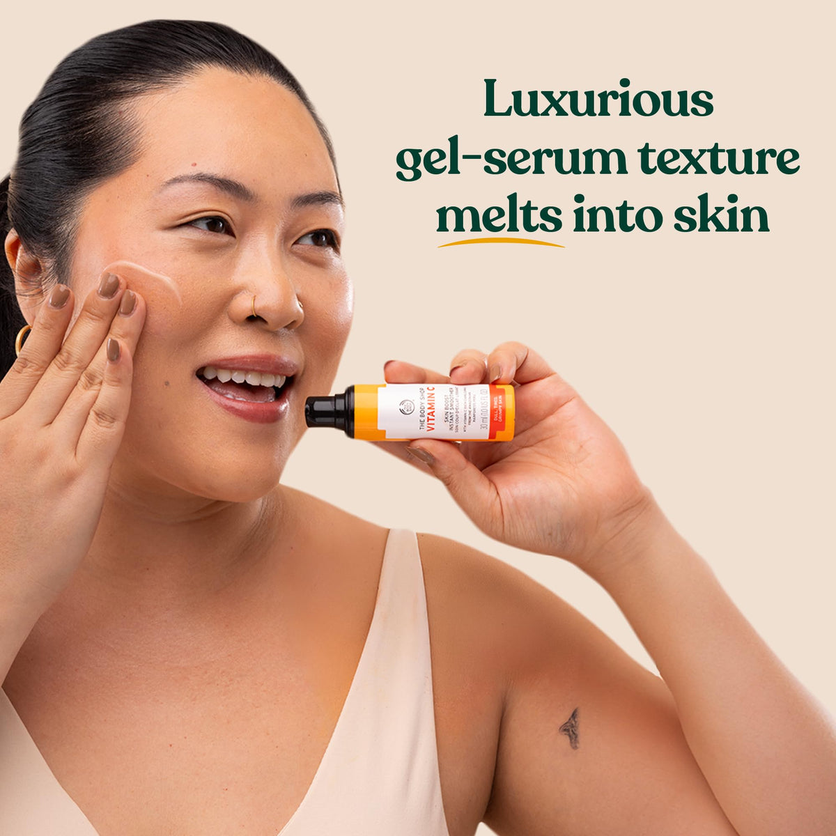 The Body Shop serum dispensed on skin, illustrates instant smoothing finish