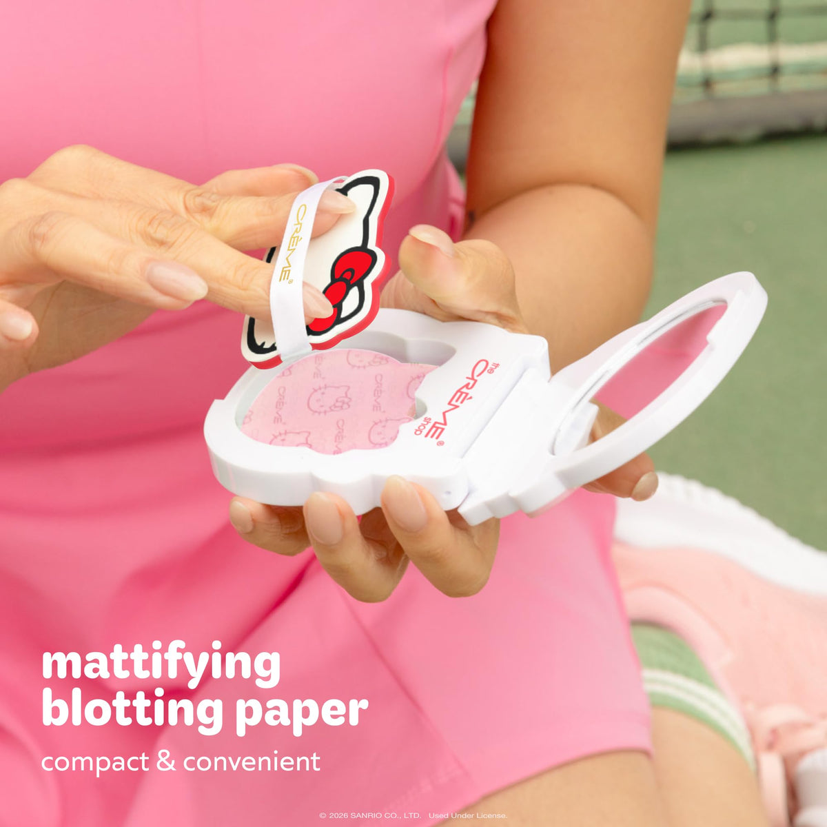 Close-up texture of Hello Kitty green tea blotting paper demonstrating oil absorption