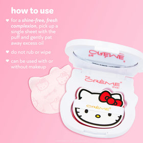 Open compact with mirror and puff visible displaying The Crème Shop touch-up setup