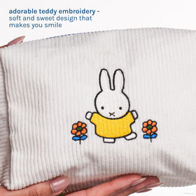 The Crème Shop Miffy zipper and hang-tag close-up showing secure closure