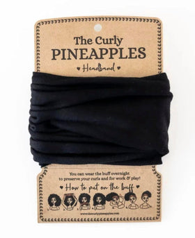The Curly Pineapples front view showing matte black band and fit benefit