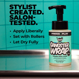 The Doux applied during a roller set for smoother, frizz-reduced results