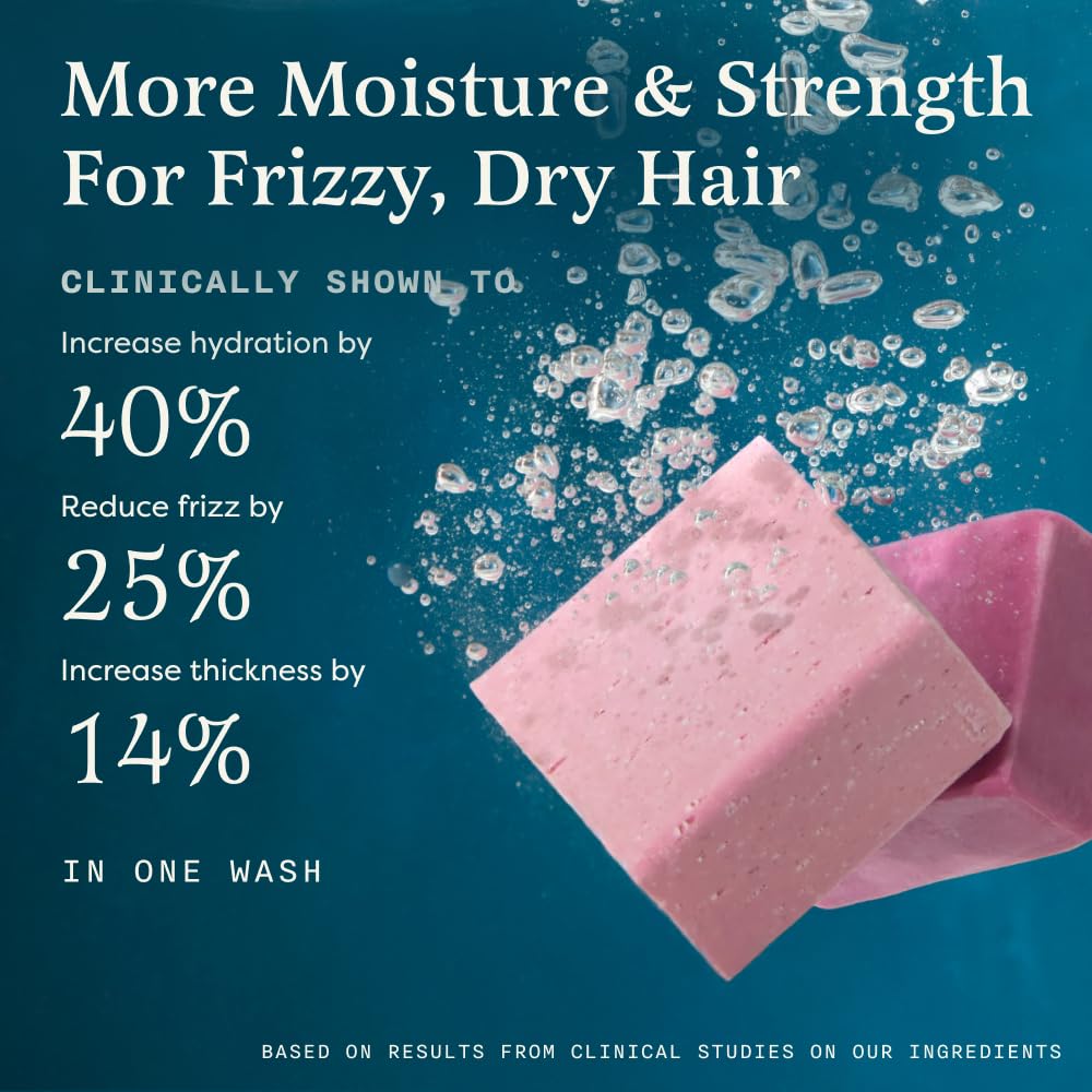 The Earthling Co. conditioner bar with lather demonstrating detangling effect
