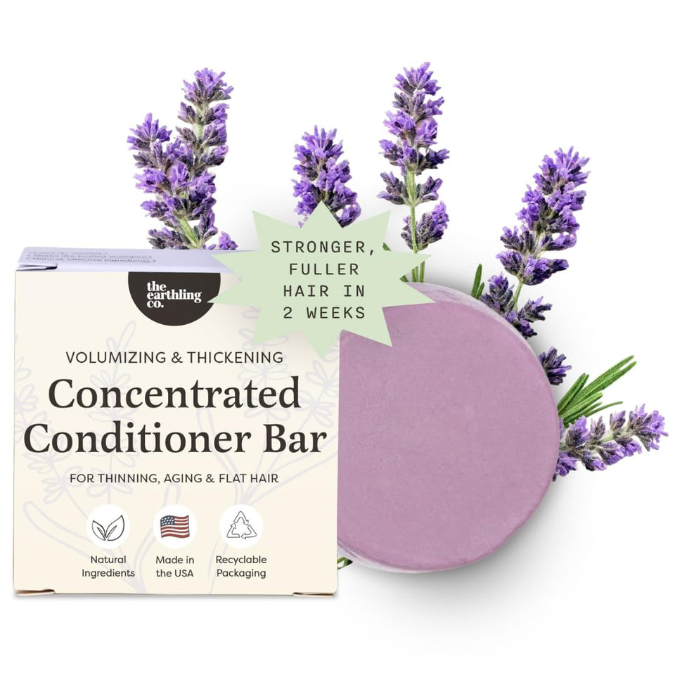 the earthling co. front packaging showing compact conditioner bar and benefits