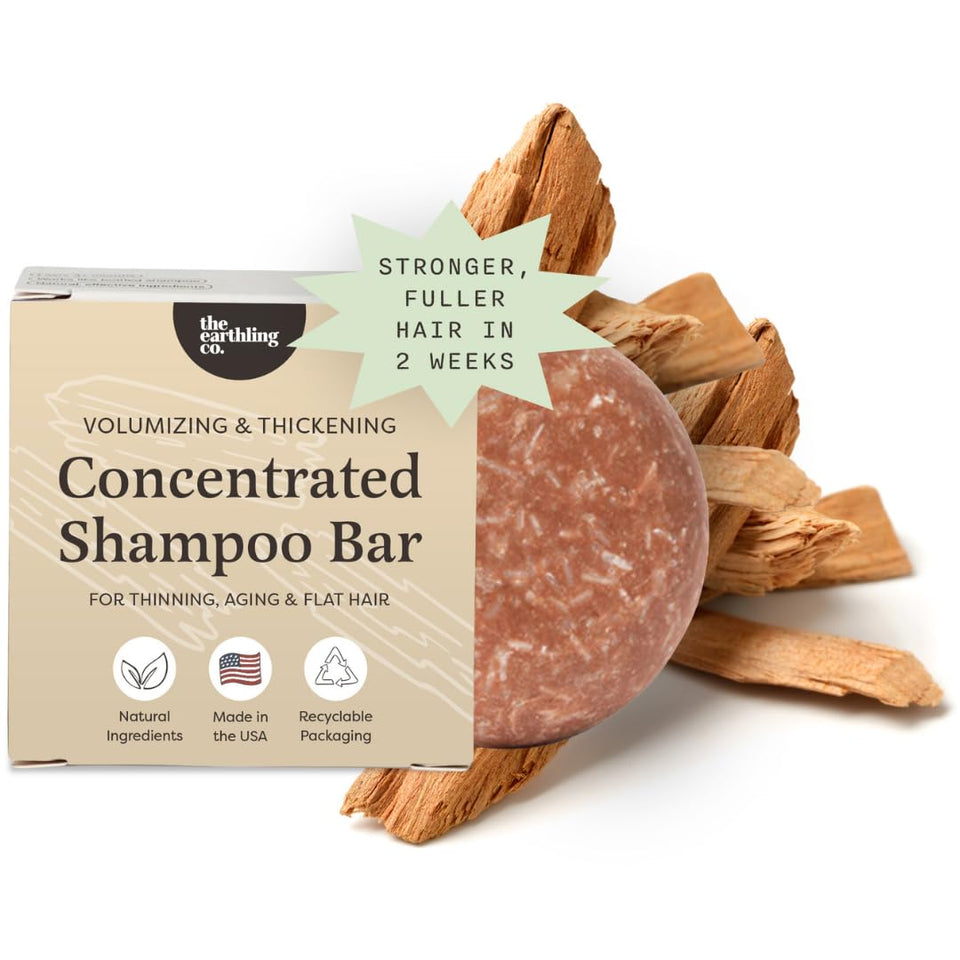 The Earthling Co. front packaging showing volumizing shampoo bar benefits
