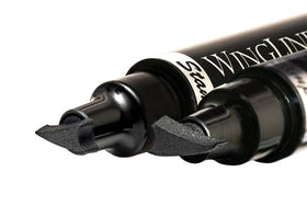 the flick stick open assembly revealing stamp and pen components for easy maintenance