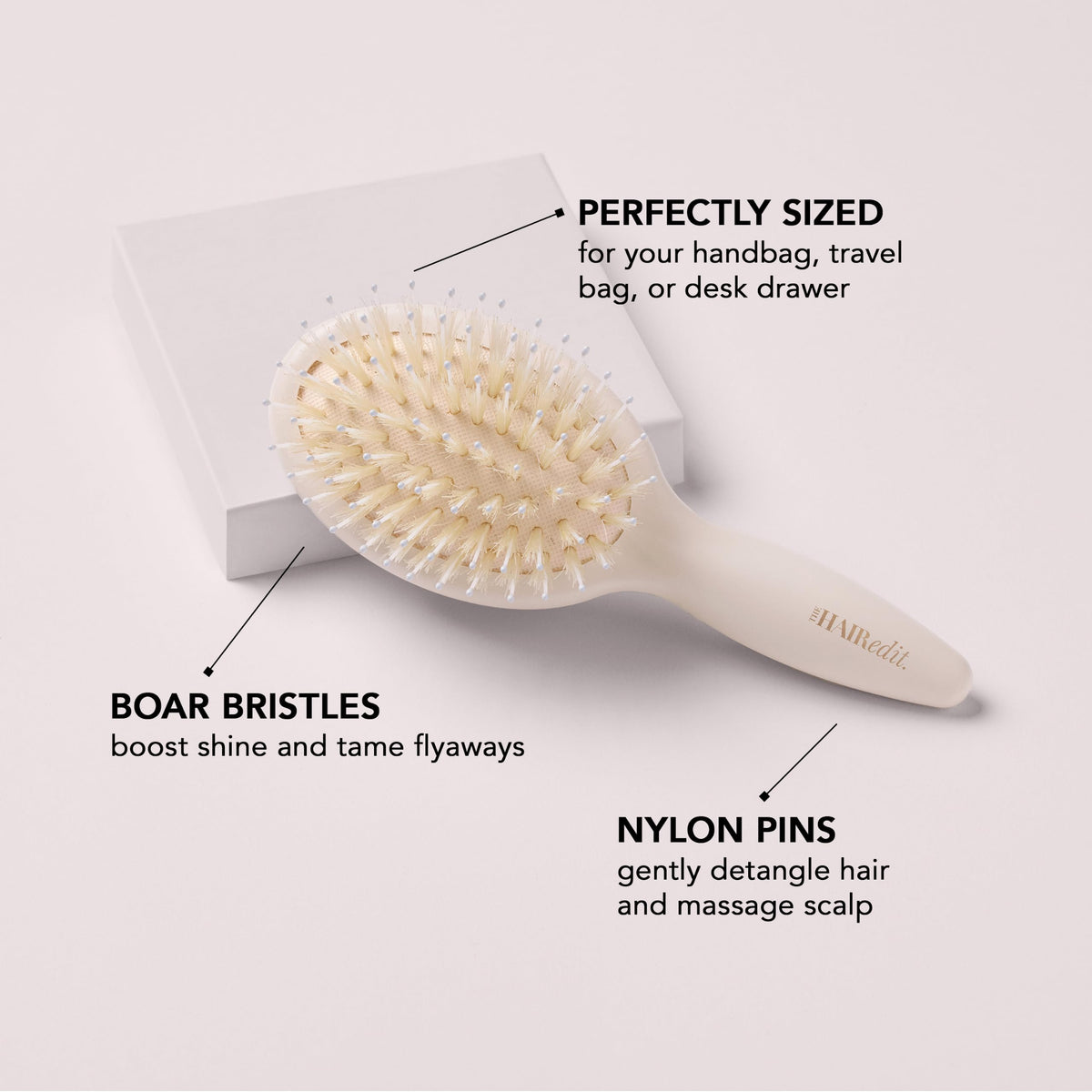 The Hair Edit close-up of boar bristles and nylon pins smoothing cuticles for shine