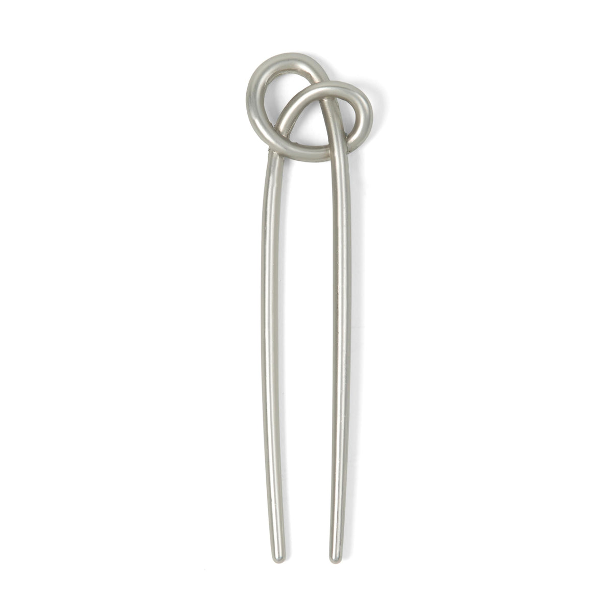 The Hair Edit front view of knotted chignon pin shows elegant secure styling