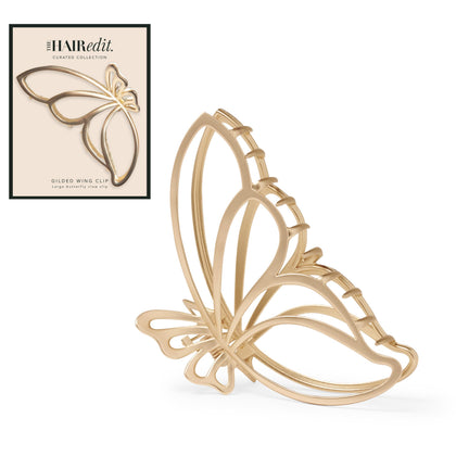The Hair Edit front view of gilded wing clip showing elegant gold finish and style