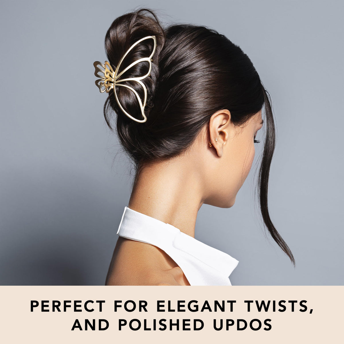 The Hair Edit clip holding a twisted bun showing secure all-day styling benefit