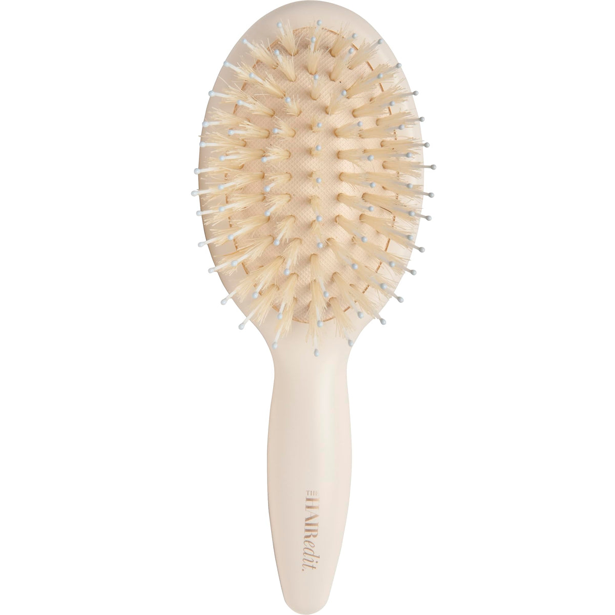 The Hair Edit mini brush front view showing sleek compact design and travel convenience