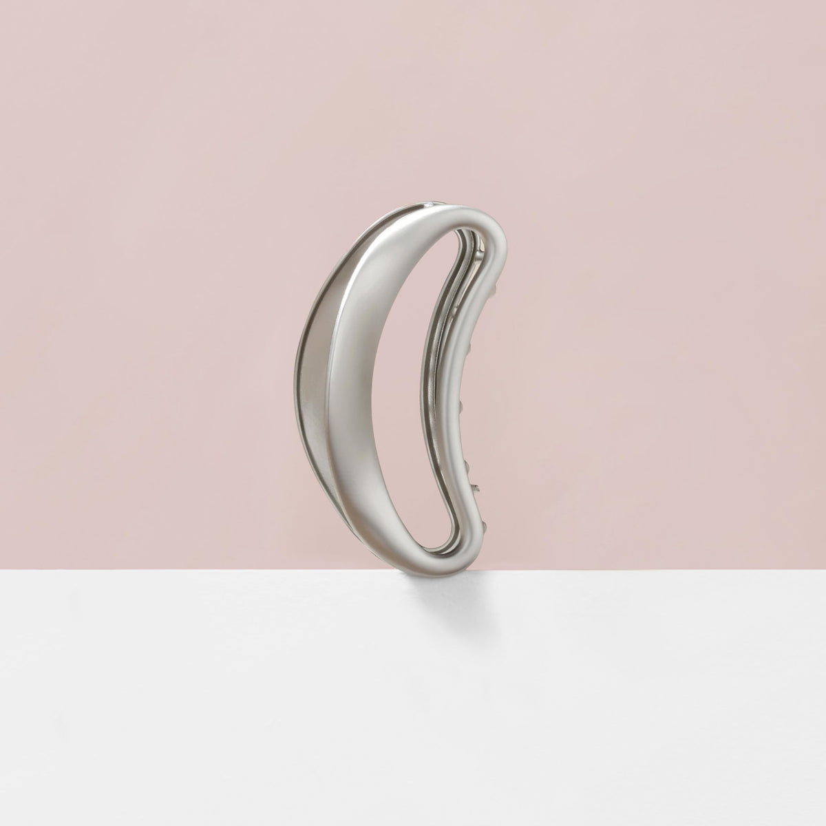 The Hair Edit clip securing a full updo for a secure, all-day hold