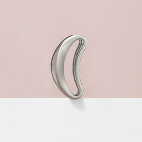 The Hair Edit clip securing a full updo for a secure, all-day hold