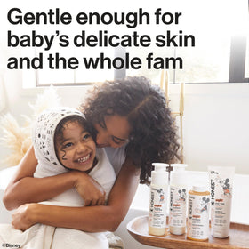 The Honest Company conditioner on hand demonstrating application for gentle conditioning benefit