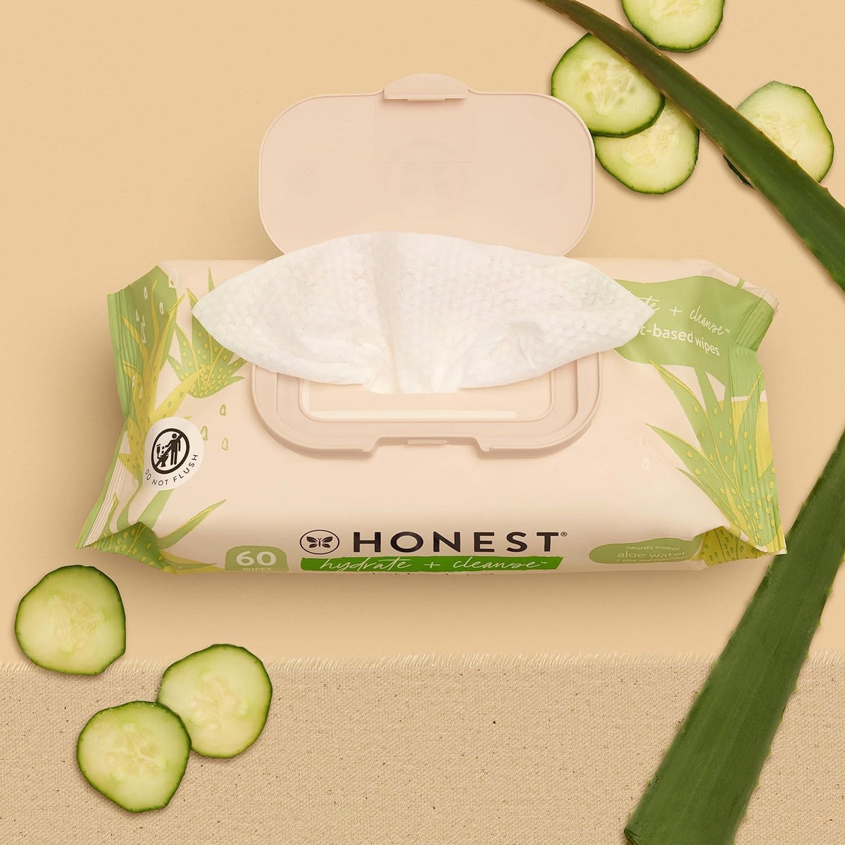 The Honest Company open top dispenser revealing easy single-wipe dispensing benefit