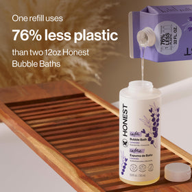 Pouring Honest refill into bottle, saving plastic and extending product life