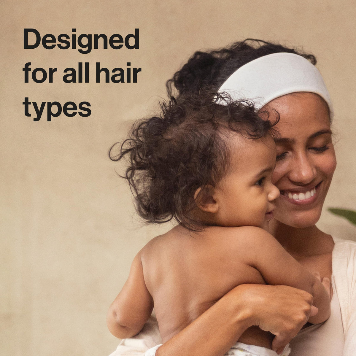 Parent and child using The Honest Company detangler showing tear-free convenience
