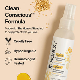 Fine mist texture of The Honest Company spray illustrating lightweight conditioning