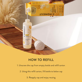 The Honest Company 32oz carton beside 10oz bottle showing volume savings