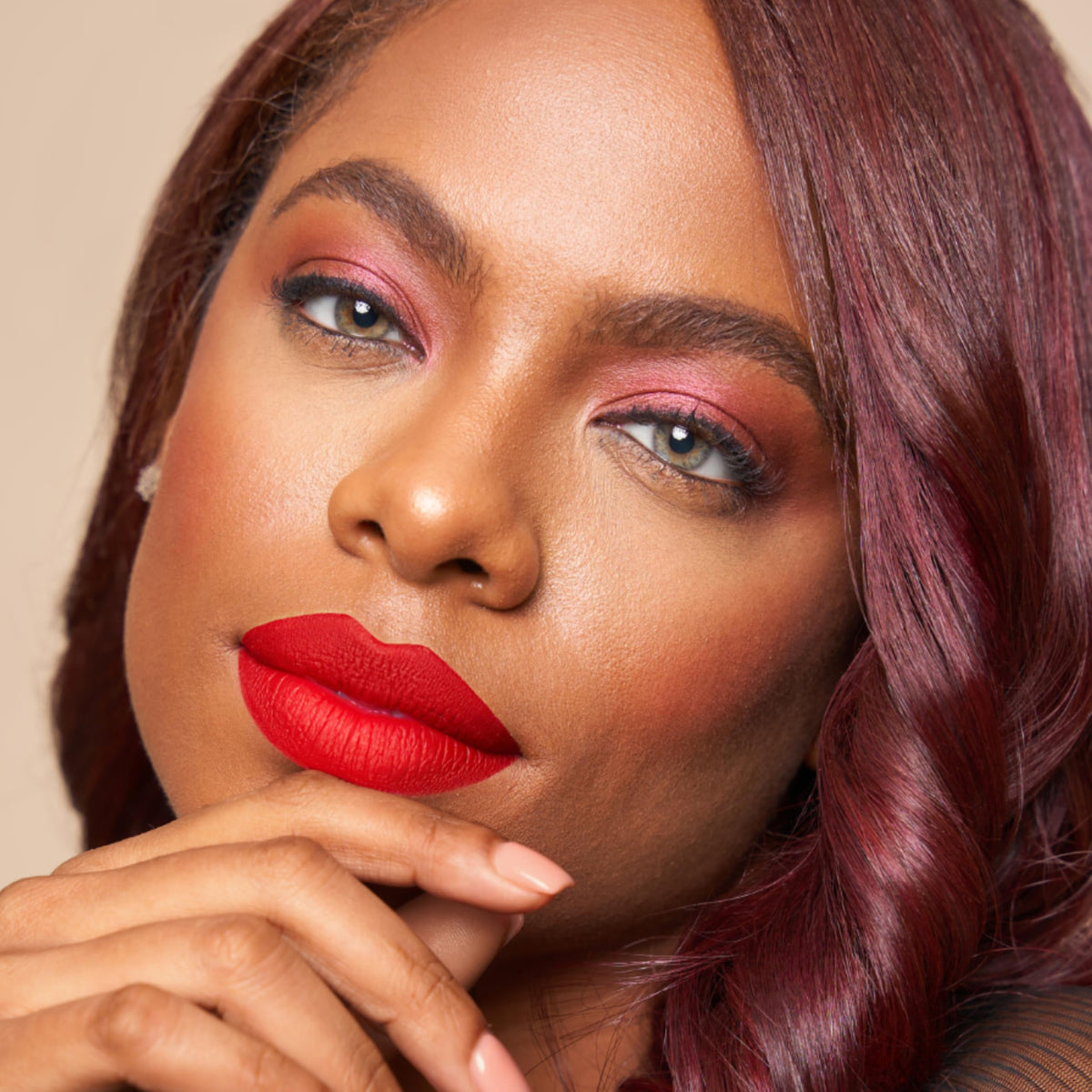 The Lip Bar layered with gloss to show customizable shine and dimension