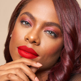 The Lip Bar layered with gloss to show customizable shine and dimension