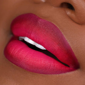 Close-up swatches of The Lip Bar shades Bawse Lady, Muse, Playmate, clear color payoff