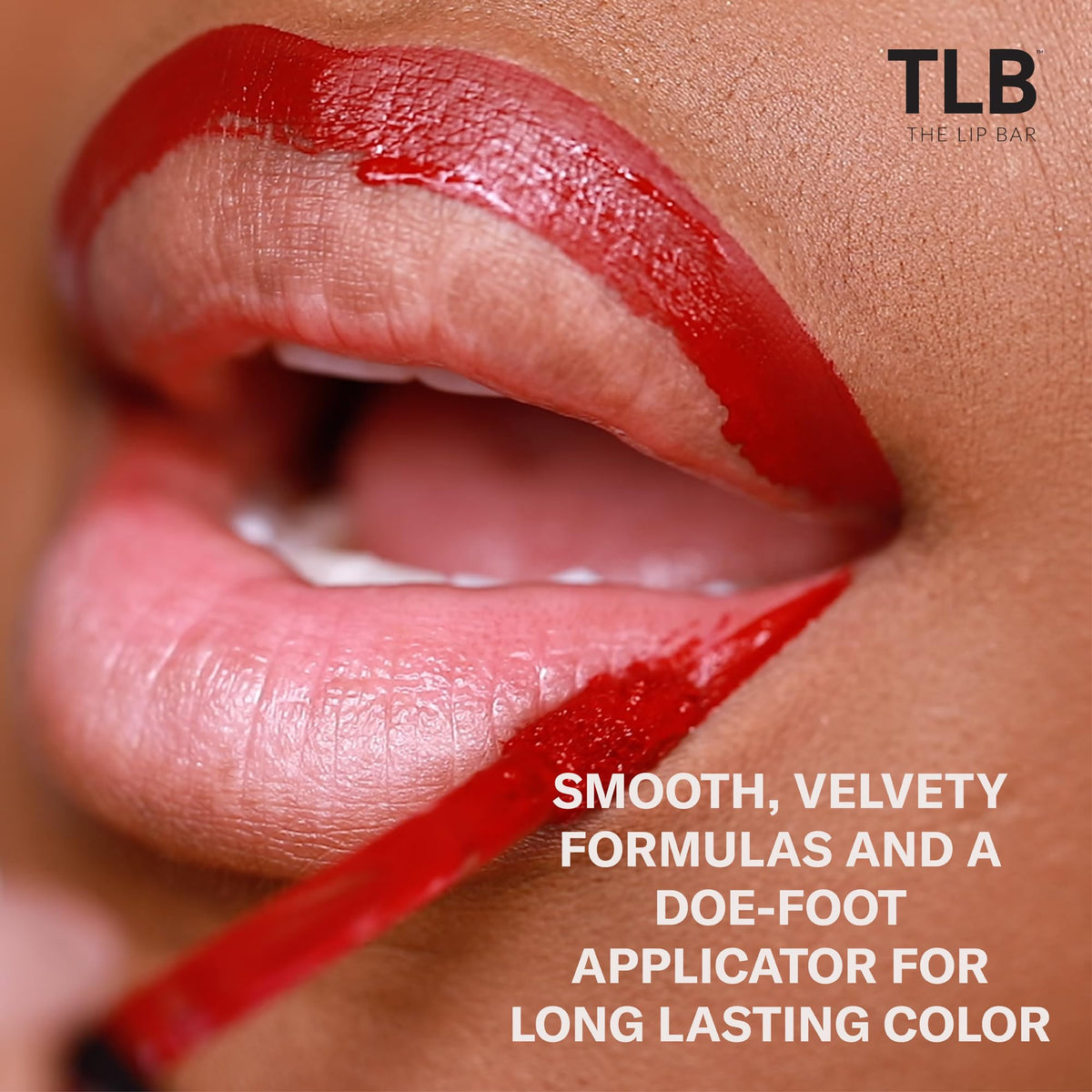 The Lip Bar travel-size trio in hand to show compact, portable scale