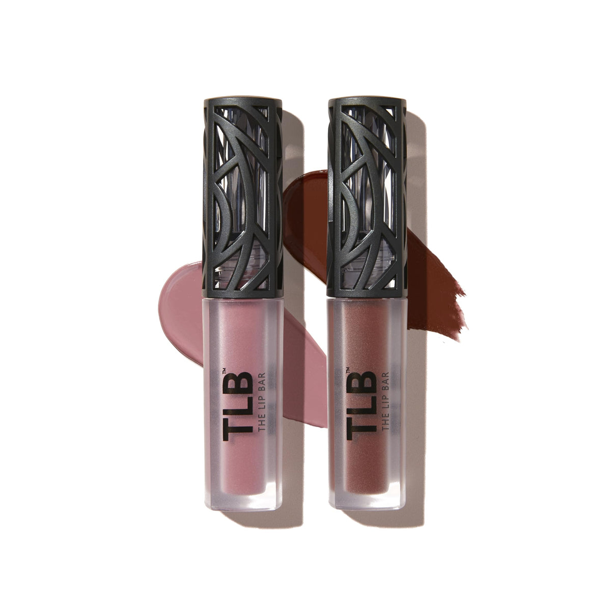 The Lip Bar applicator wand close-up showing precise tip for even application