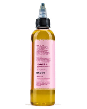 The Mane Attraction applied to braids and locs protecting moisture and sheen