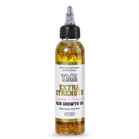 The Mane Attraction bottle front label showing product benefits