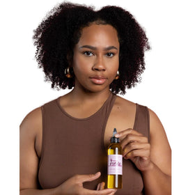 The Mane Attraction bottle in bathroom routine showing daily-use convenience