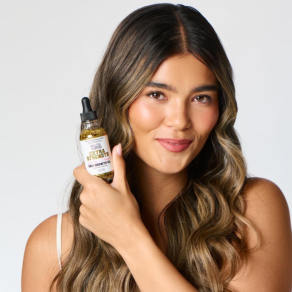 The Mane Attraction ingredient display with castor and rosemary benefits