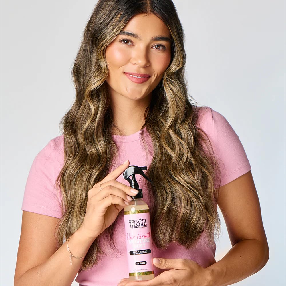 The Mane Attraction being applied to scalp to hydrate and promote manageability