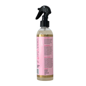 The Mane Attraction next to an 8 fl oz scale to show true product size