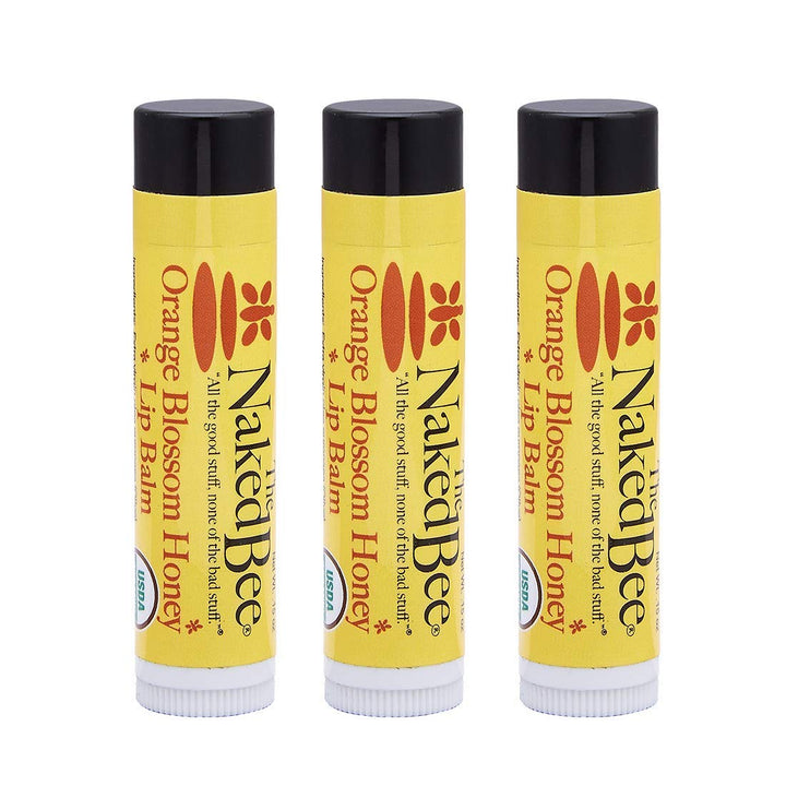 The Naked Bee front packaging showing three lip balm tubes and flavor