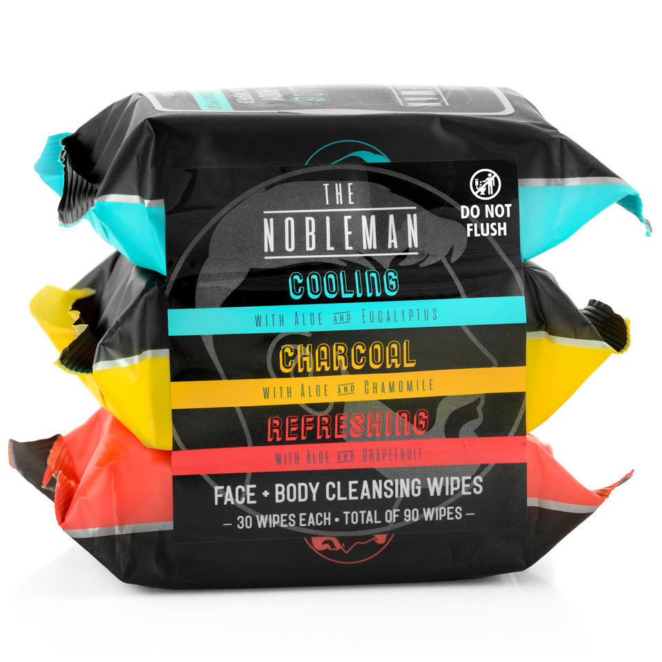 The Nobleman front view of three resealable wipe pouches showing pack labels and count for portability benefits