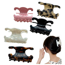 The Only One arranged five-color clips in lifestyle scene showing styling versatility