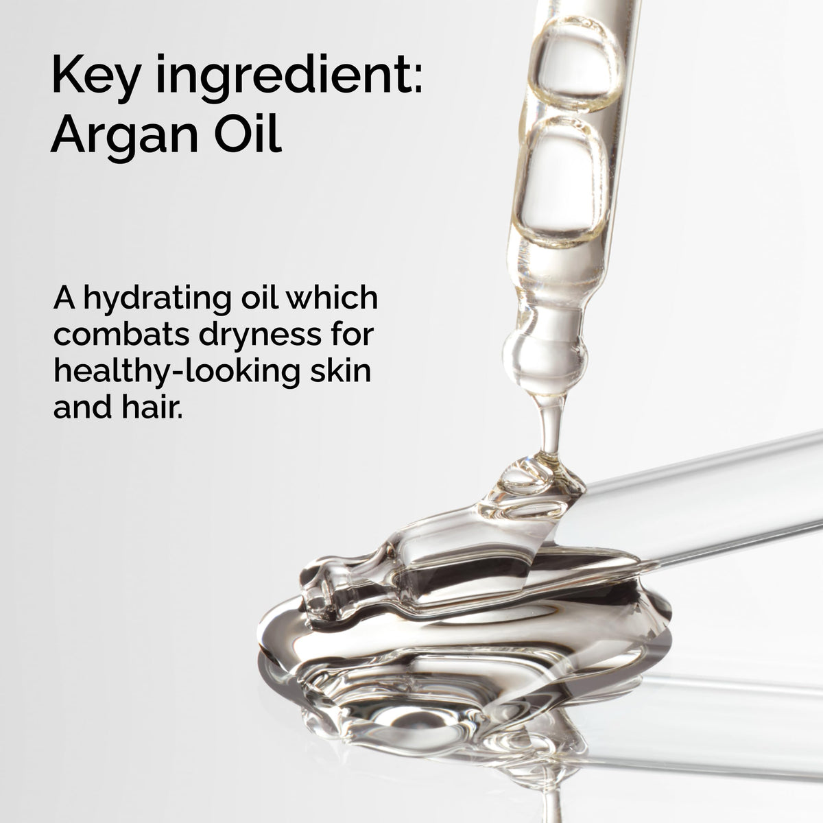 The Ordinary argan oil pipette releasing golden drops highlighting purity and hydration