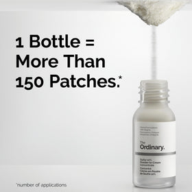 The Ordinary bottle beside a coin showing small travel-friendly size