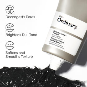 Application of The Ordinary masque on cheek demonstrating targeted pore cleansing