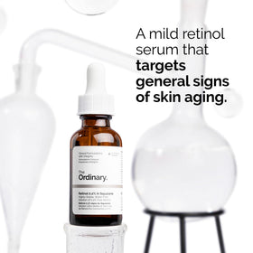 The Ordinary retinol dropper dispensing oil-serum texture, illustrating lightweight conditioning effect