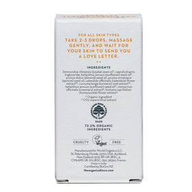 The Organic Skin Co. bottle in a spa scene conveying calming honeysuckle scent benefit