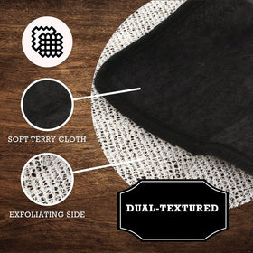 The Rustic Man wash cloth held in hand to show actual size and easy handling benefit