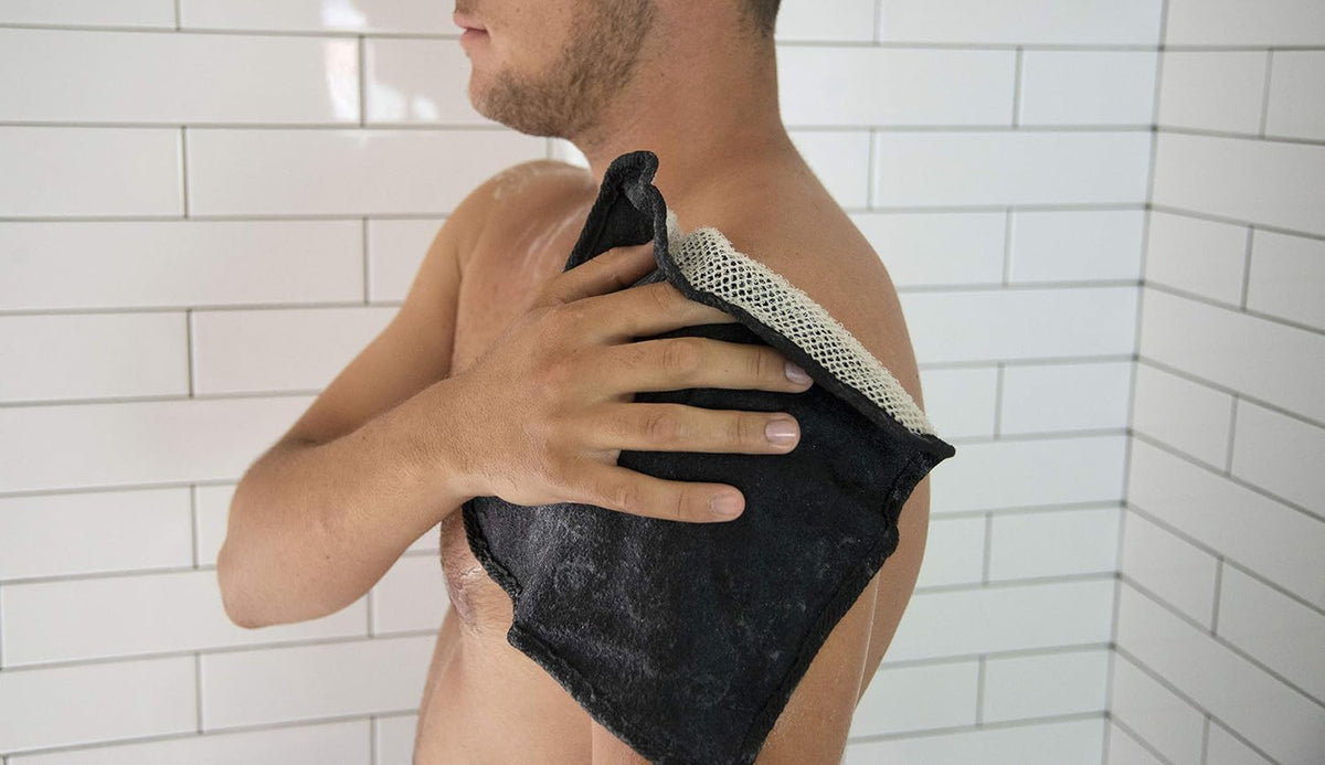 The Rustic Man terry side wiping face to show soothing use after shaving and comfort benefit