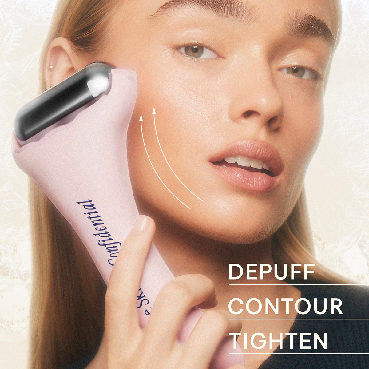 The Skinny Confidential roller beside hand for size comparison and quick full-face coverage