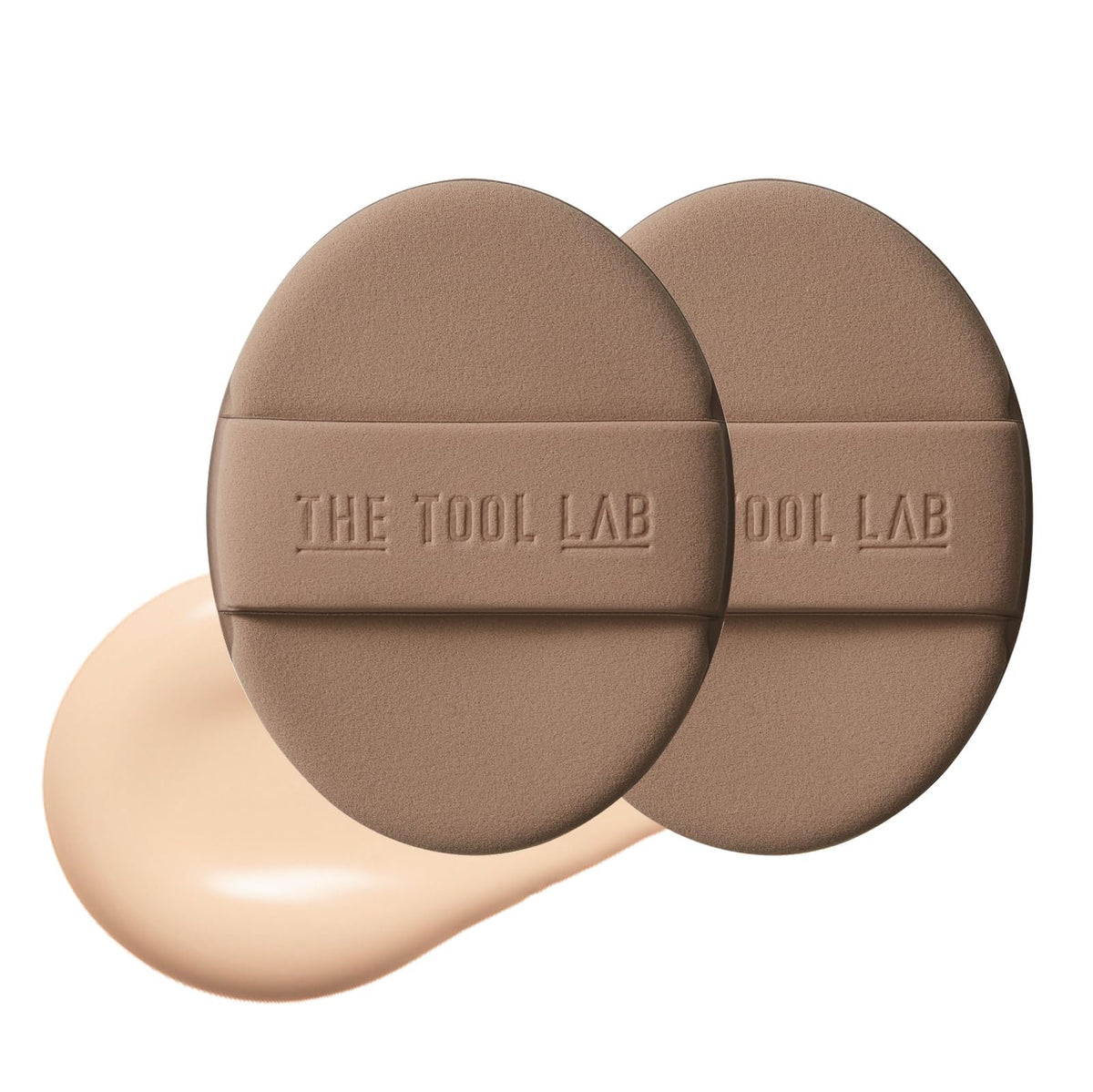 THE TOOL LAB oval puff front view showing shape and smooth glow finish benefits blending