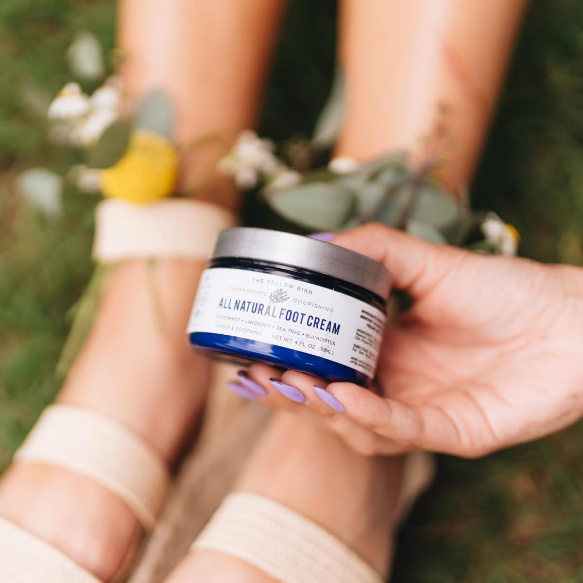 The Yellow Bird nighttime routine with socks demonstrating overnight softening benefit